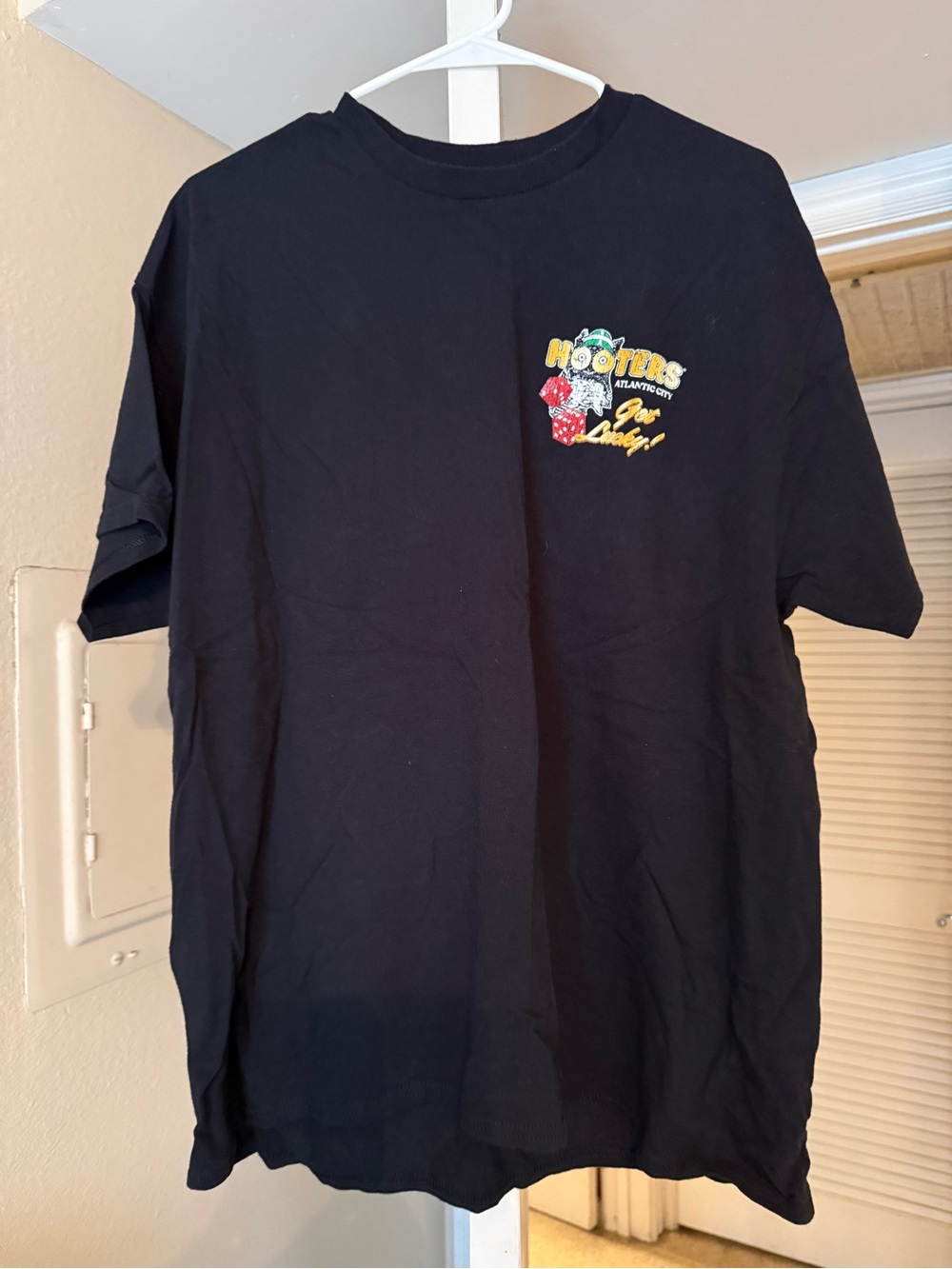 Hooters Black Short Sleeve T-Shirt with Small Colorful Chest Graphic